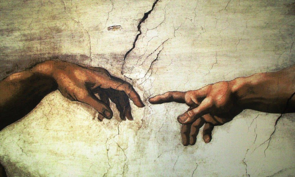 Ausschnitt aus Michelangelos "Erschaffung des Adam"